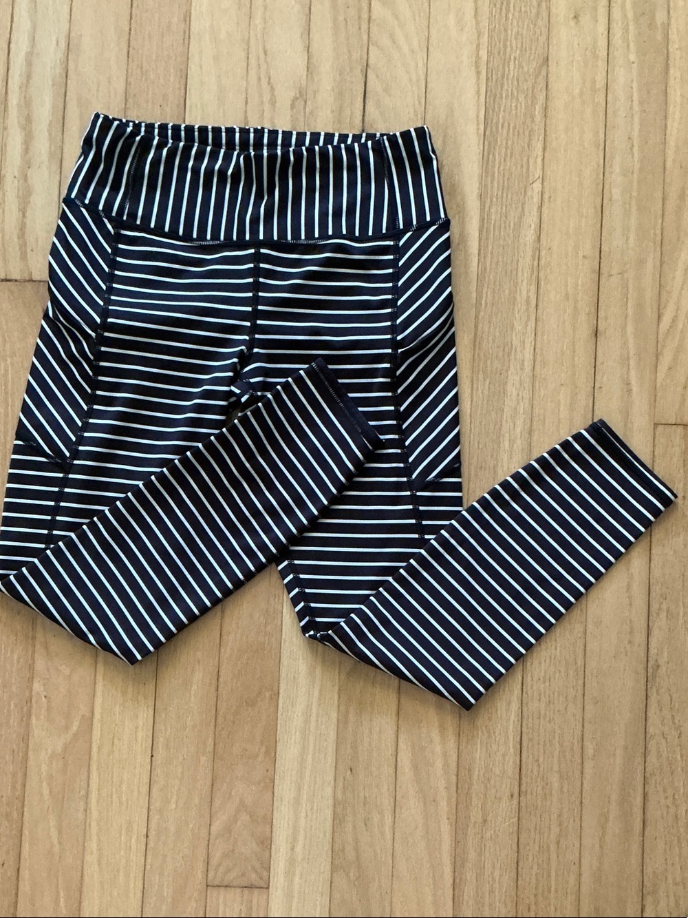 Athleta Stripe Contender 7/8 compression leggings with zippered pockets